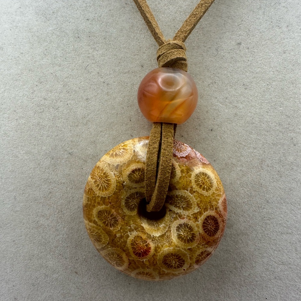 Brown and Tan Coral Fossil Donut Pendant Necklace on Brown Faux Suede - Picture 3 of 13